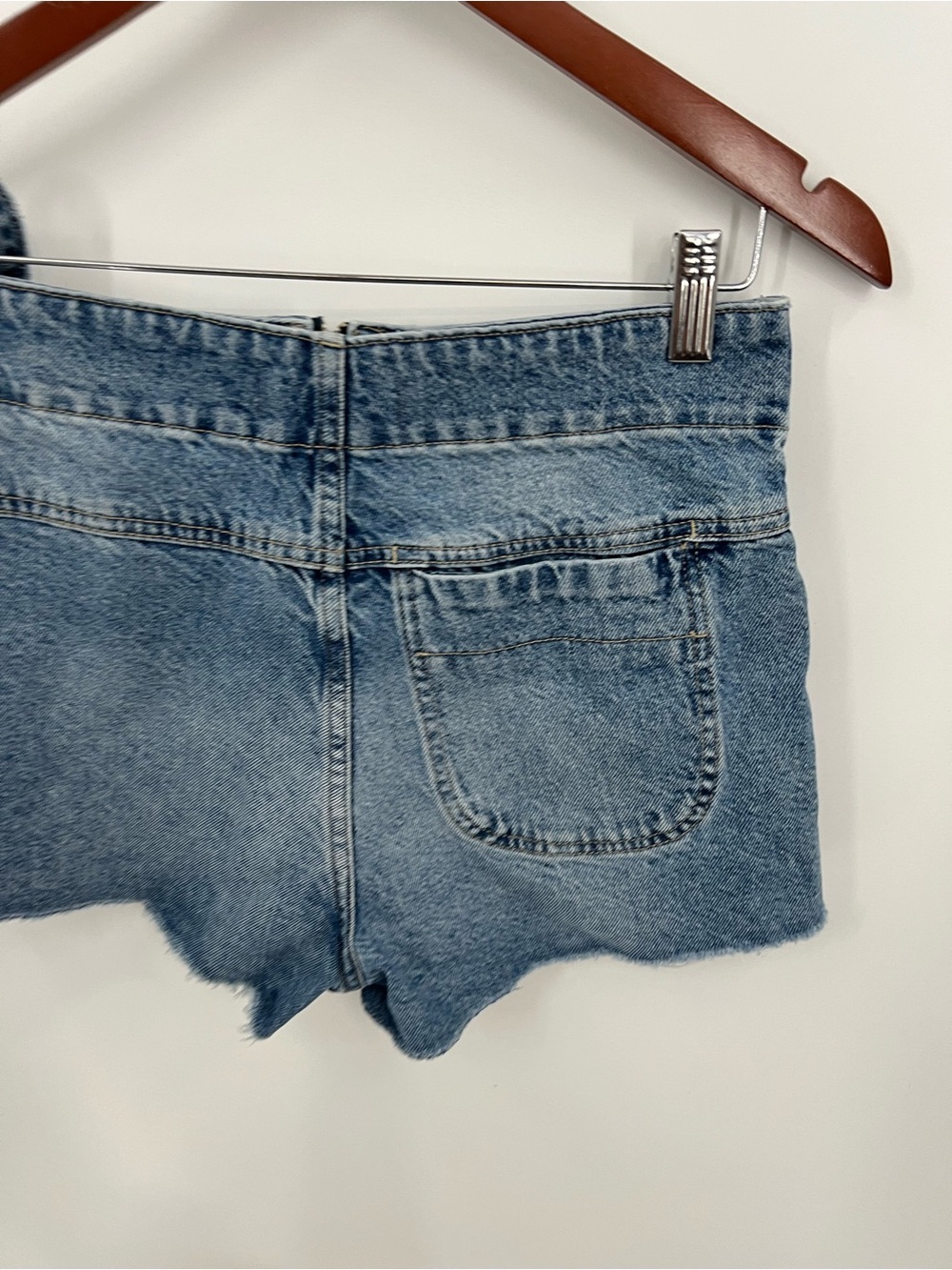 Free People Emmy Denim Faux Wrap Mini Skort with Side Tie - Picture 5 of 12